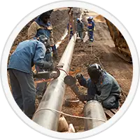 Picture of people working on a pipeline